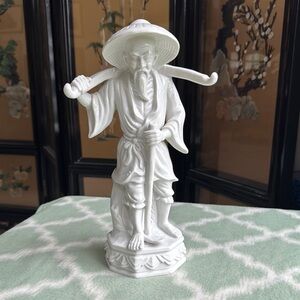 Vintage White Porcelain Asian man i. Traditional attire Figurine